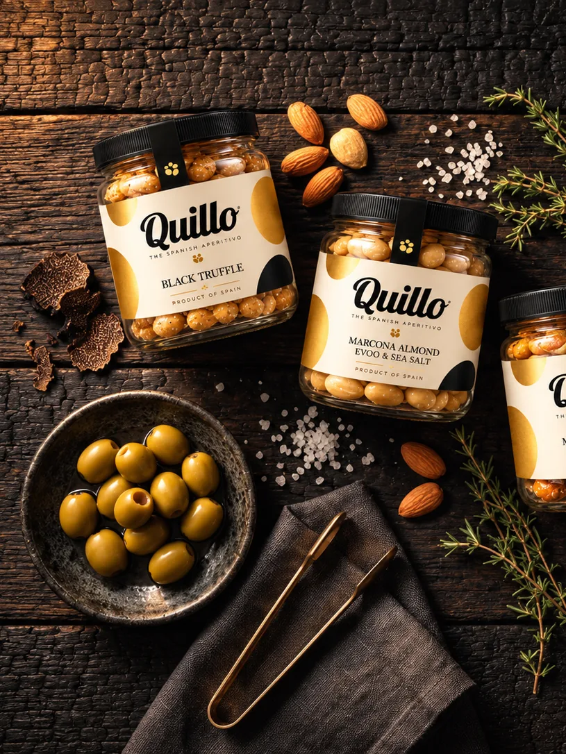 QUILLO Black Truffle and Marcona Almond jars on dark wood